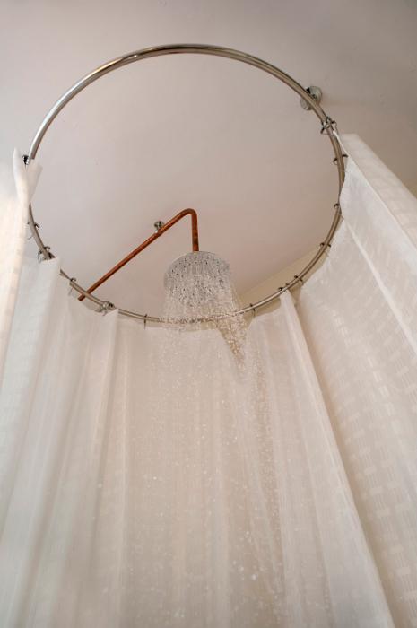 Free Stock Photo: an old fashined metal shower head and curtain
