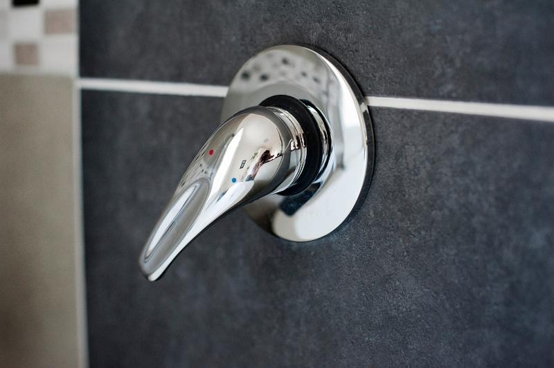 Free Stock Photo: a chrome modern style shower mixer tap or faucet