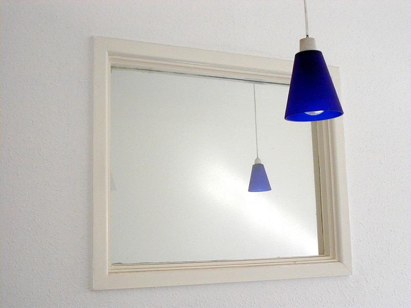 Free Stock Photo: Modern Ceiling Lamp with Contemporary Blue Shade Reflected in White Framed Mirror as part of Home Decor