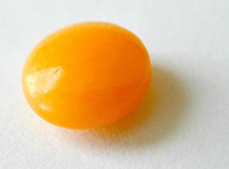 Free Stock Photo: Close up image of a round vitimin C orange supplement