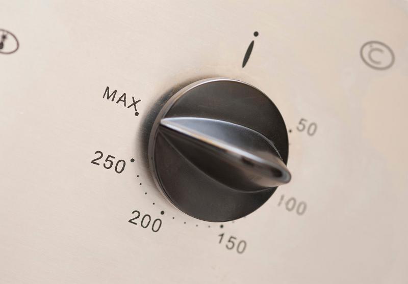 Free Stock Photo: Closeup of a plastic oven thermostat dial for controlling the temperature of the appliance during the cooking of food