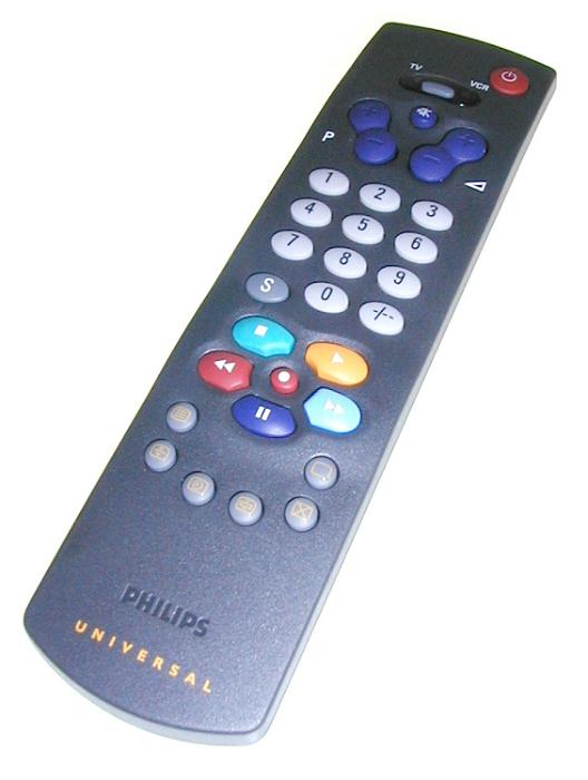 Free Stock Photo: Television universal remote control lying buttons and keypad uppermost on a white background angled away from the viewer