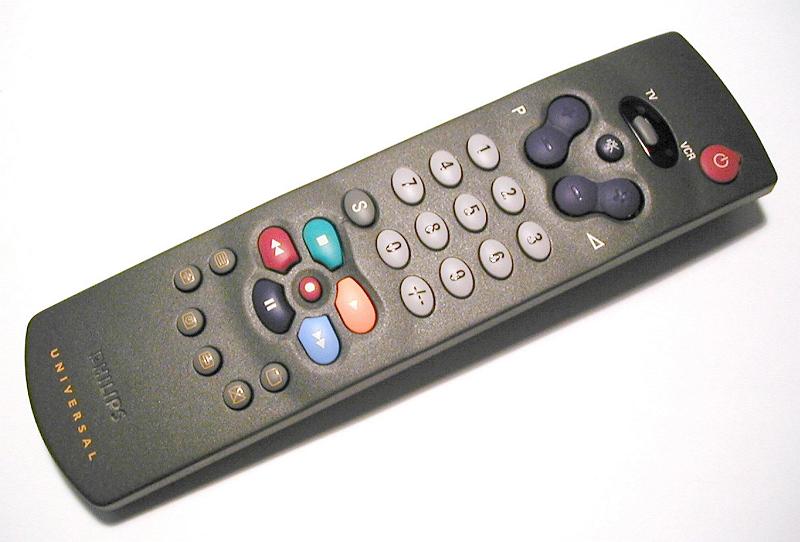 Free Stock Photo: Television remote control for changing programs via wifi or infrared from the comfort of your seat, high angle view on a white background