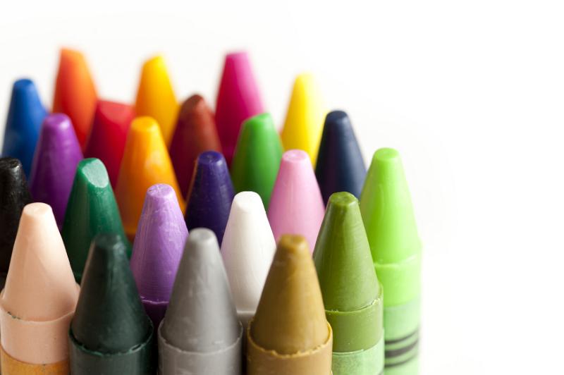 Free Stock Photo: Collection of colored wax crayon points in the colors of the spectrum viewed close up with shallow DOF over white with copy space