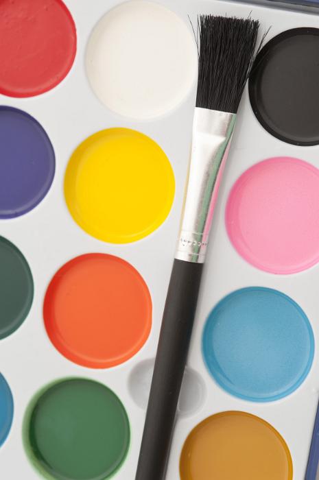 Free Stock Photo: New paint set for kids with colorful watercolor paints and a new paint brush in a concept of creativity, education and art