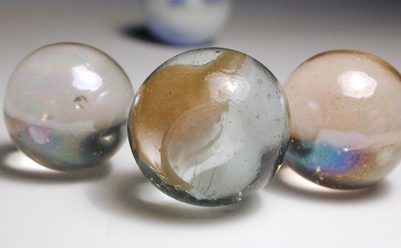 Free Stock Photo: closeup on some glass marbles