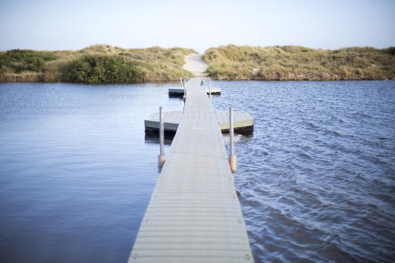 Free Stock Photo: Floating pedestrian bridge crossing the lake, smoothening the ripples on water surface