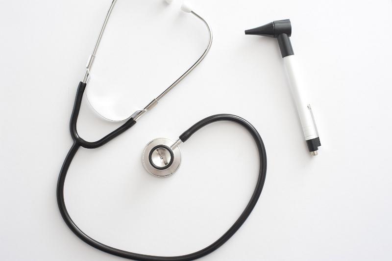 Free Stock Photo: Stethoscope and otoscope isolated on white viewed from above in a healthcare and medicine concept with copy space
