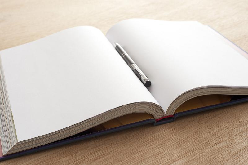 Free Stock Photo: Starting a fresh page concept with open book with blank pages and pen lying on a wooden table