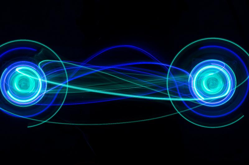 Free Stock Photo: two circles of light with intertwined filaments of light between
