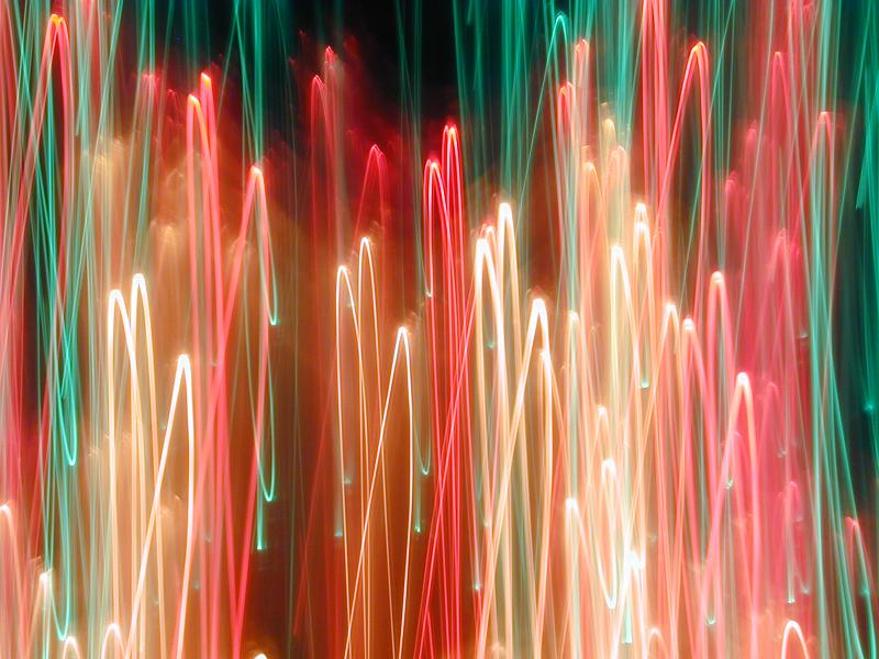 Free Stock Photo: vertical streaks of light painted patterns in warm festive colours