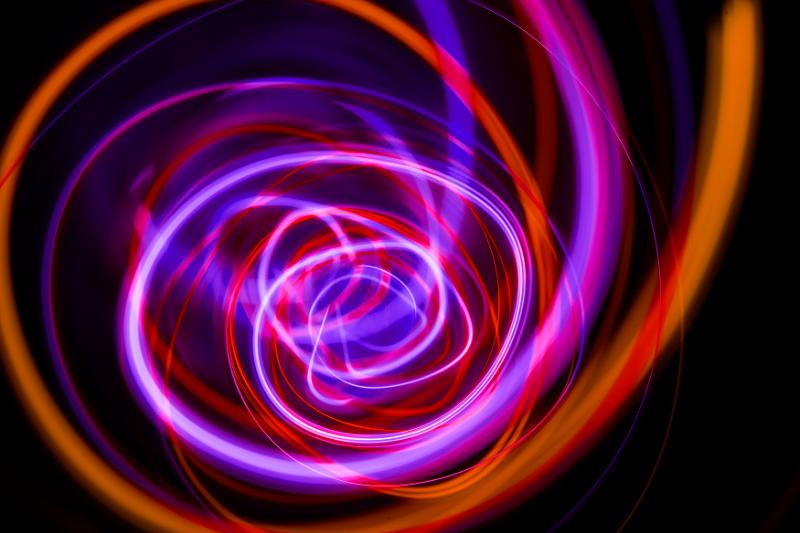 Free Stock Photo: chaotic spiral of orange red and purple lines emoting a sense of energy