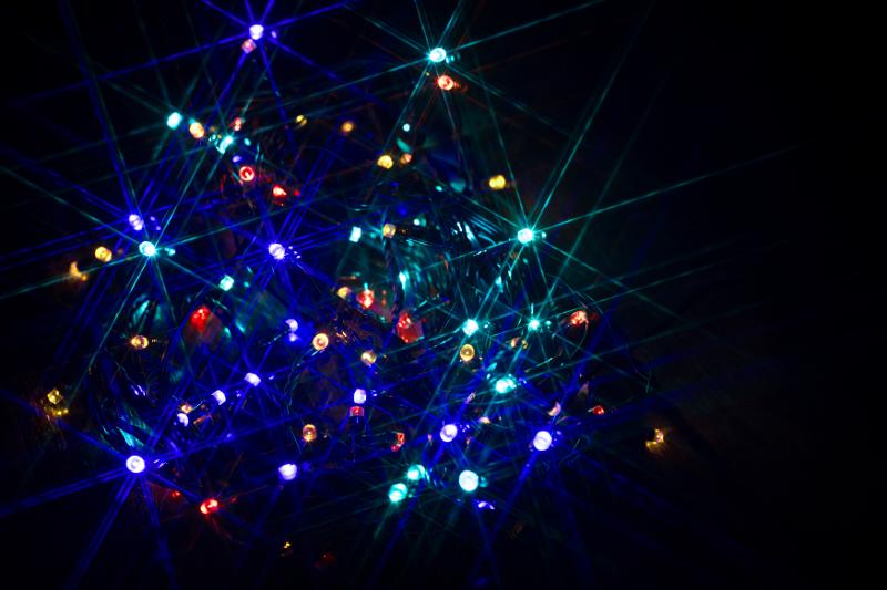 Free Stock Photo: a twinking background colourful fairylights with sparkles of light emitting from them
