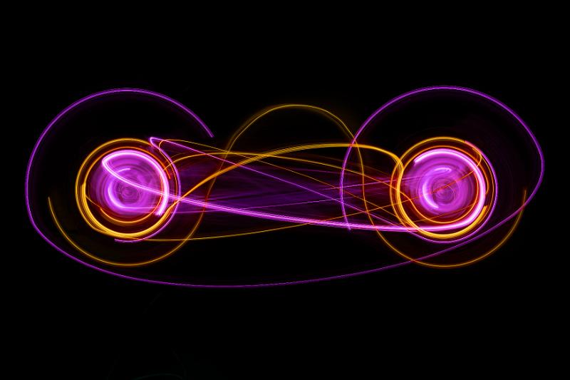 Free Stock Photo: lightpainting of two circular shapes with interconnected ribbons of light