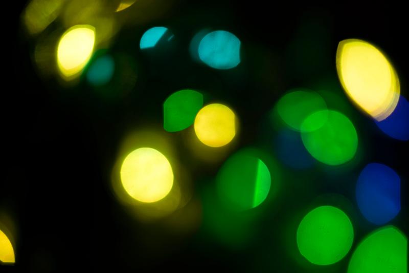 Free Stock Photo: distorted bokeh light shapes in a range of greens blues and yellow