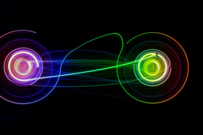 Free Stock Photo: colourful spinning lights with traces of light connecting between