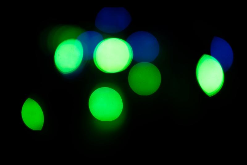 Free Stock Photo: green and blue background with distant distorted lights in the darkness