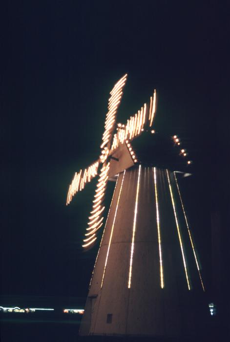 Free Stock Photo: motion blurred night time picture of an illuminated windmill