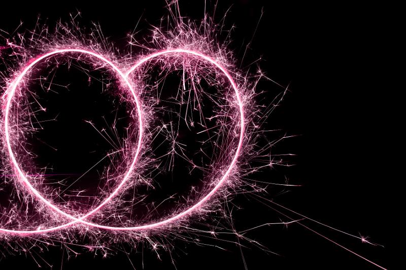 Free Stock Photo: a looping pink sparkler trace including a heart shape within