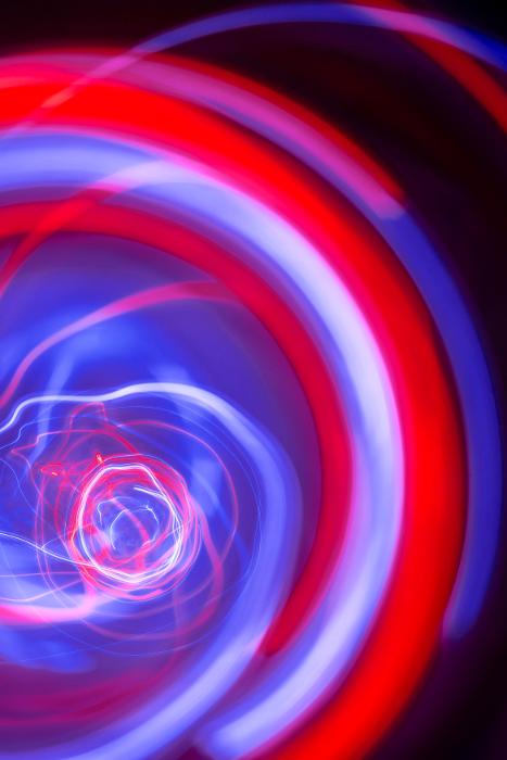 Free Stock Photo: an electrifying swirl of light trails in a spiral or rotating motif