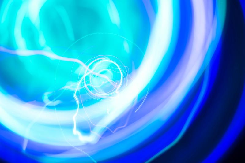 Free Stock Photo: a storm of vivid dynamic light in cyan and blue representative of energy and charge