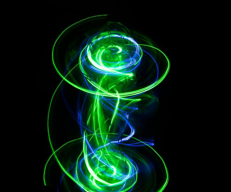 Free Stock Photo: a spiraling light painting with dynamic traces of vivid green and blue light
