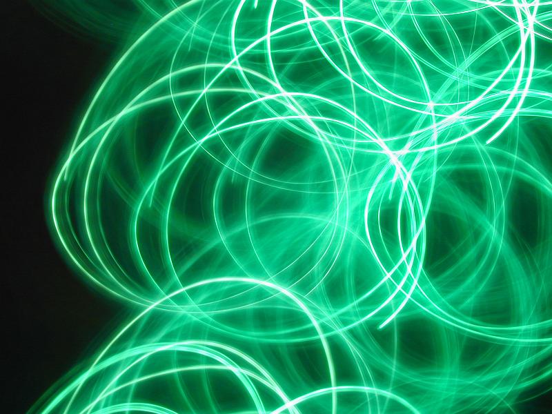 Free Stock Photo: overlapping swirls of green light showing depth