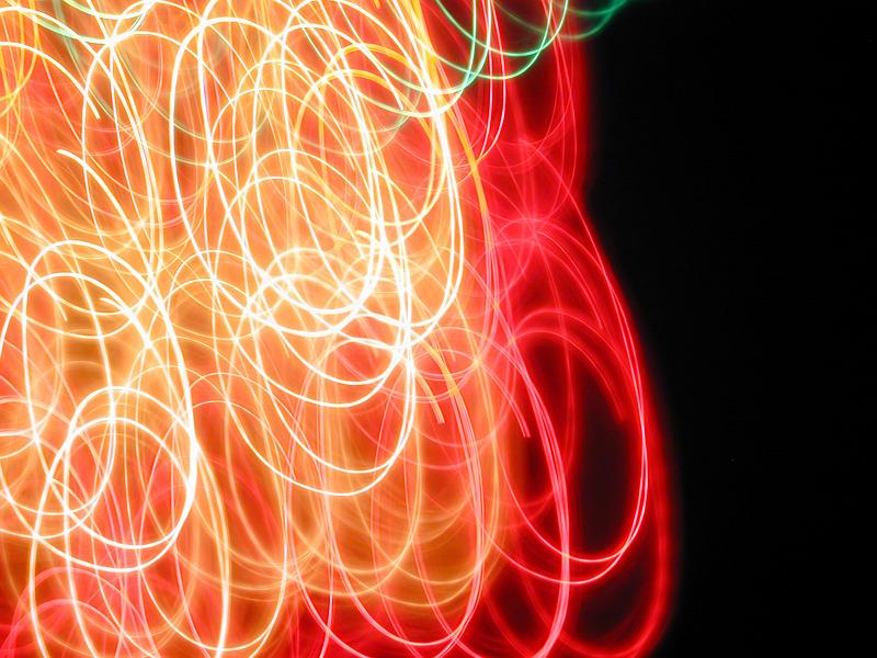 Free Stock Photo: overlapping tangled swirls of orange and red light