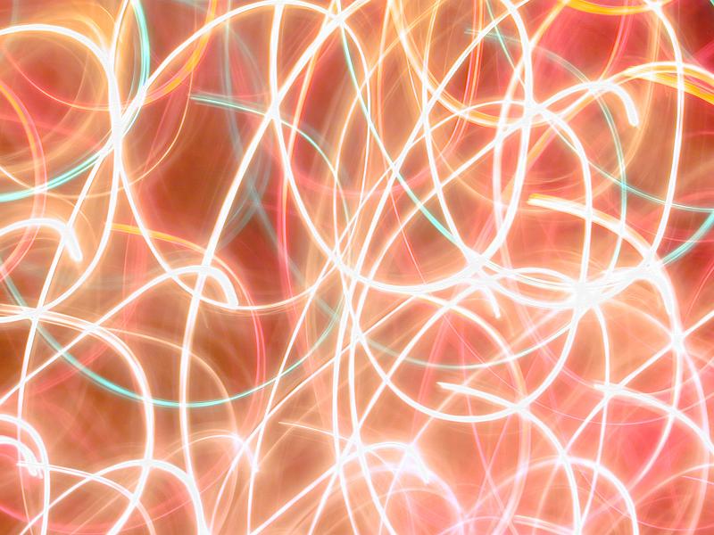 Free Stock Photo: a background of brilliant golden glowing crisscrossing light traces