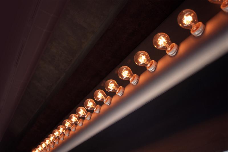 Free Stock Photo: a row of glowing theatre lights or make up mirror lights