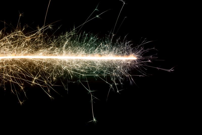 Free Stock Photo: a vibrant line of light emitting sparks either side