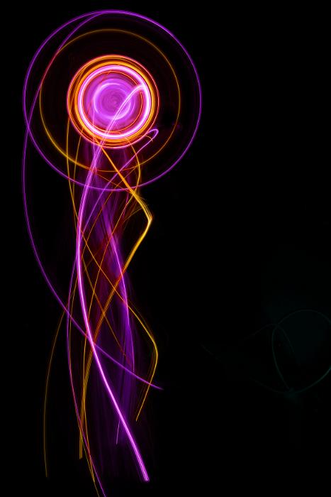 Free Stock Photo: a creative vivid light painting with round focal point and trailing curved lines
