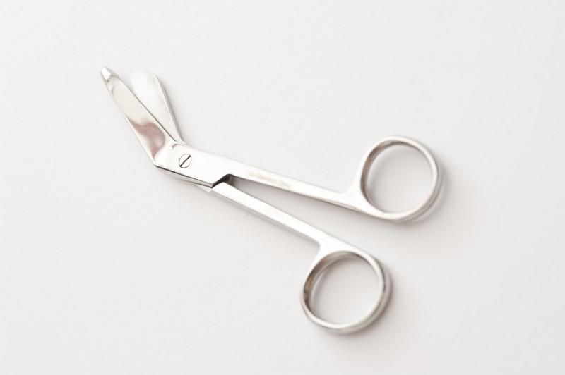 Free Stock Photo: Single partially open stainless steel gauze scissors on white background with set down shadow