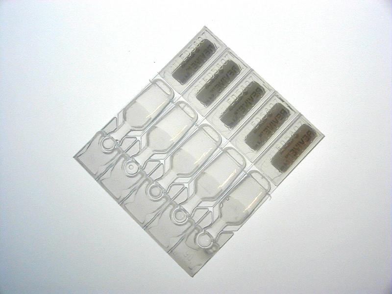 Free Stock Photo: Strip of disposable plastic eyedroppers containing single dose medication for application to the eyes to avoid any possible contamination through re-use