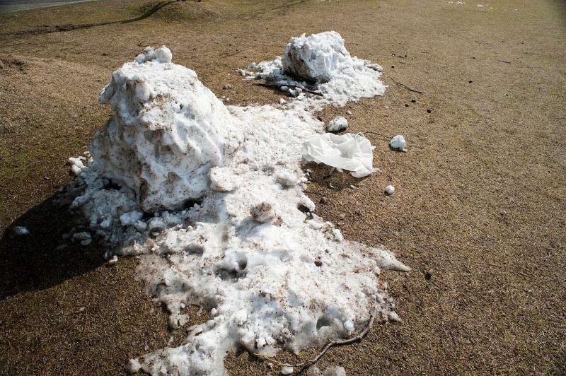 Free Stock Photo: Compacted dirty snow lying on the ground, an indication of changing weather patterns due to global warming and climate change