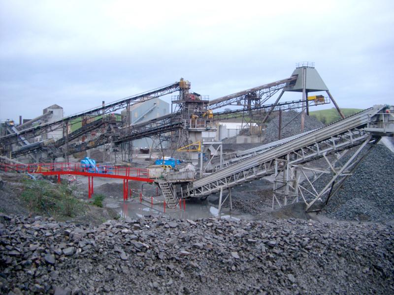 Free Stock Photo: Mining equipment and infrastructure at an opencast or strip mining site or quarry for crushed stone to be used in construction