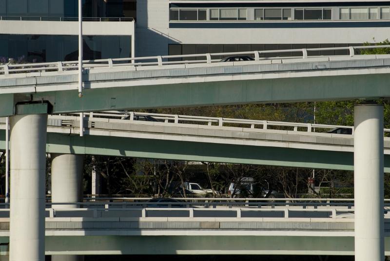 Free Stock Photo: Traffic on different levels of elevated motorways in an urban environment adding to air pollution through exhaust emissions