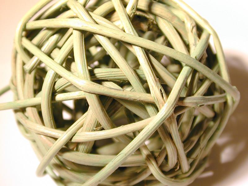 Free Stock Photo: Wicker ball texture composed of intertwined wattle wands or twigs, a rustic handicraft and decoration