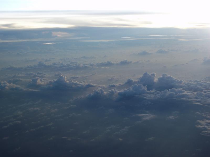 Free Stock Photo: Majestic high angle view of clouds in a blue hue as seen from plane