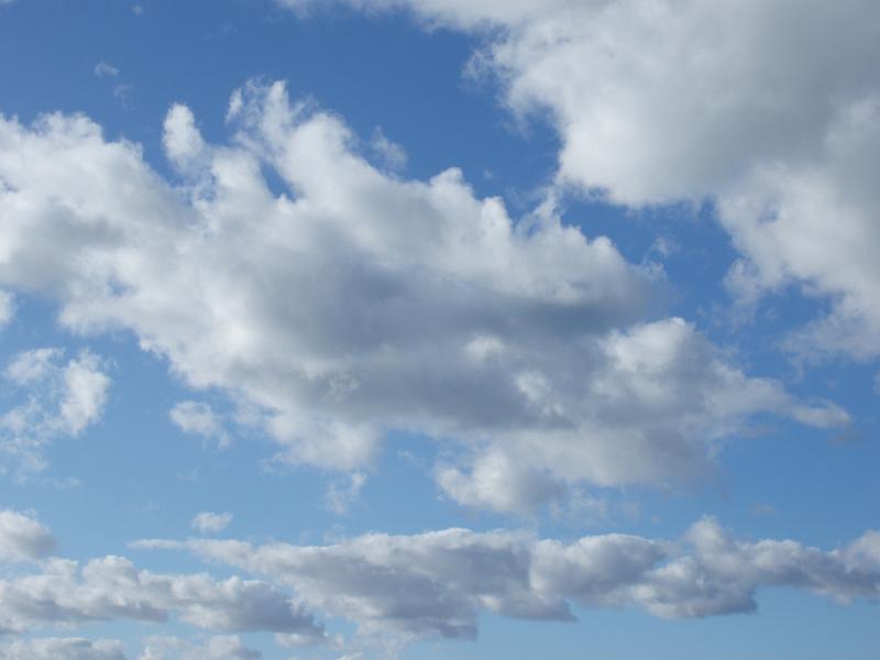 Free Stock Photo: a blue sky with white fluffy clouds