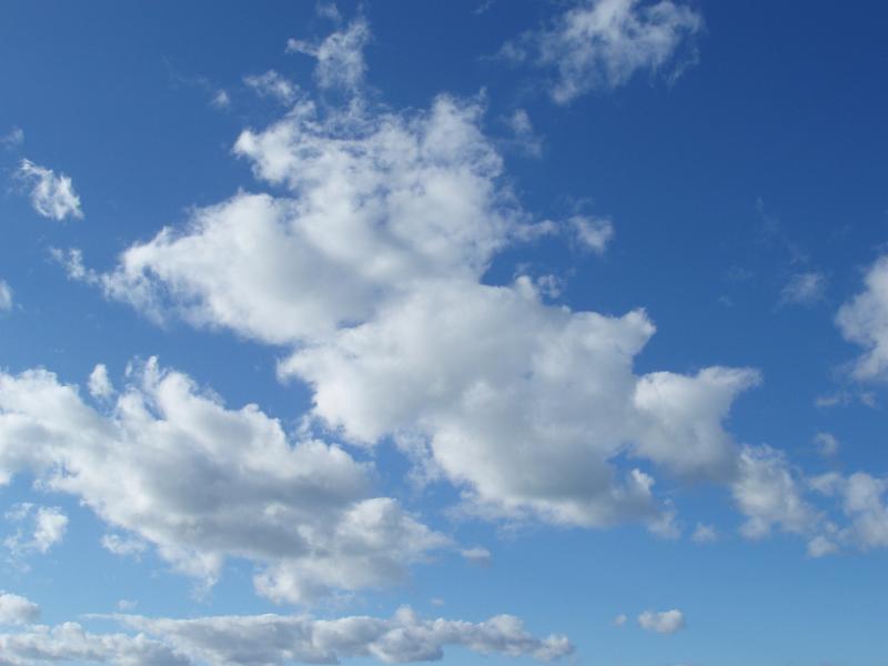 Free Stock Photo: a blue sky with white fluffy clouds