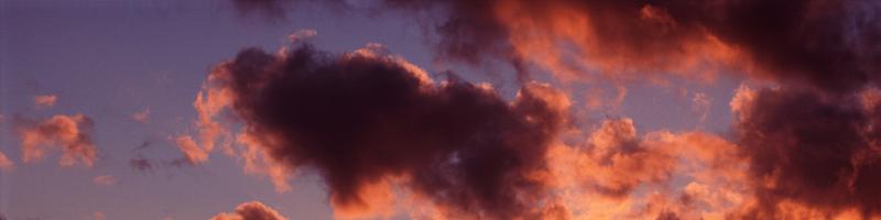 Free Stock Photo: Sunset panorama with colorful salmon pink clouds in a twilight sky, horizontal banner and background