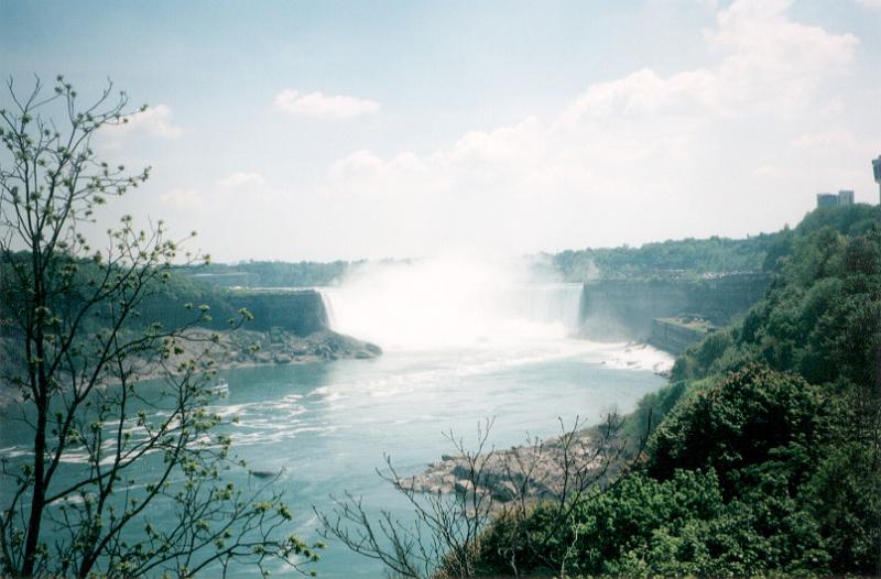 Free Stock Photo: Scenic landscape view looking upriver of the Niagara Falls partially obscured by the fine mist and spray thrown up by the falls, travel and tourism concept