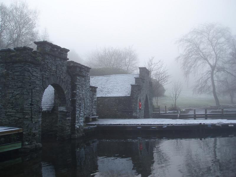 Free Stock Photo: buildings on the side of a lake shrouded in fog