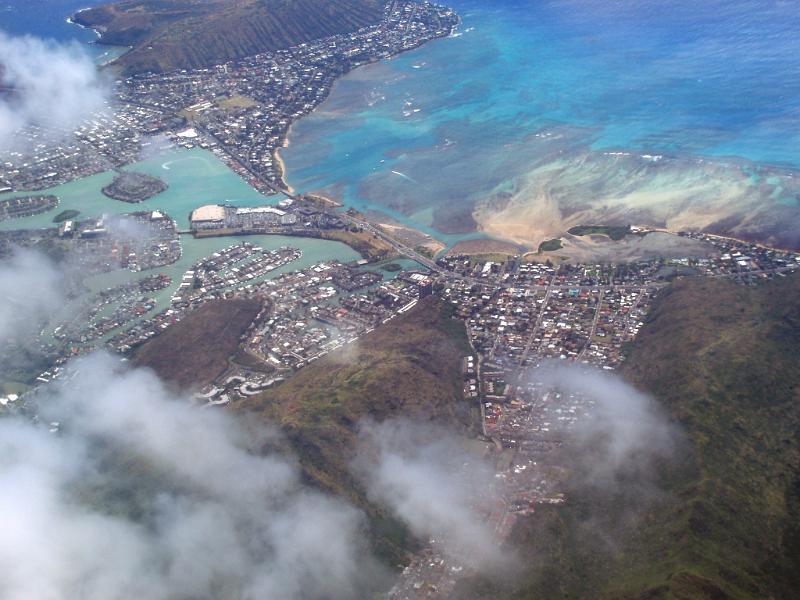Free Stock Photo: looking down on the hawaiian island through a belt of rain clouds