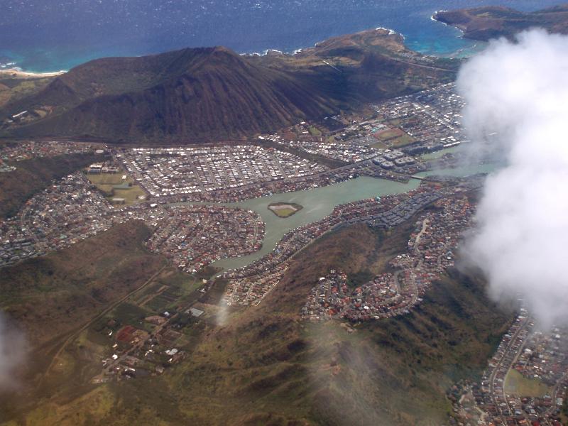 Free Stock Photo: looking down on the hawaiian islands through the rain clouds