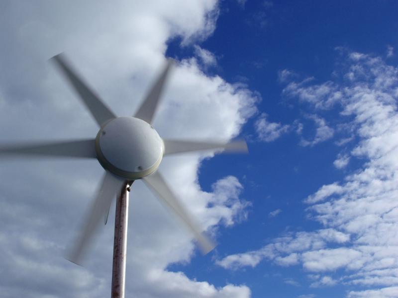 Free Stock Photo: a wind generator rotating on a windy day