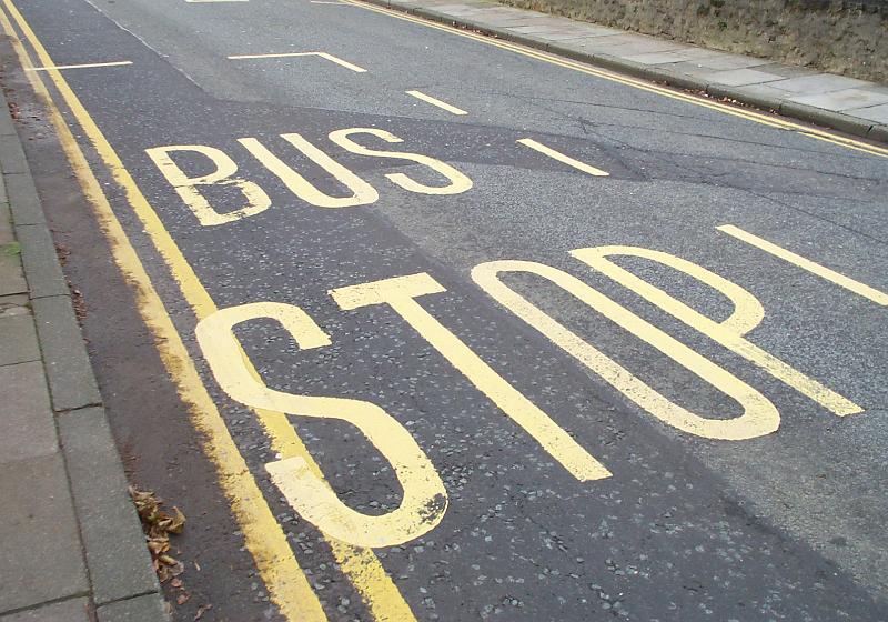 Free Stock Photo: Bus stop place road marking with the sign painted on asphalt with yellow paint