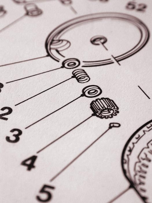 Free Stock Photo: Expanded mechanical diagram or drawing showing component parts of a machine numbered for the ordering of spares and identification