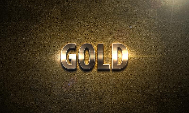 Free Stock Photo: Metallic Gold sign illuminated on a textured antique gold colored background in the centre of the frame